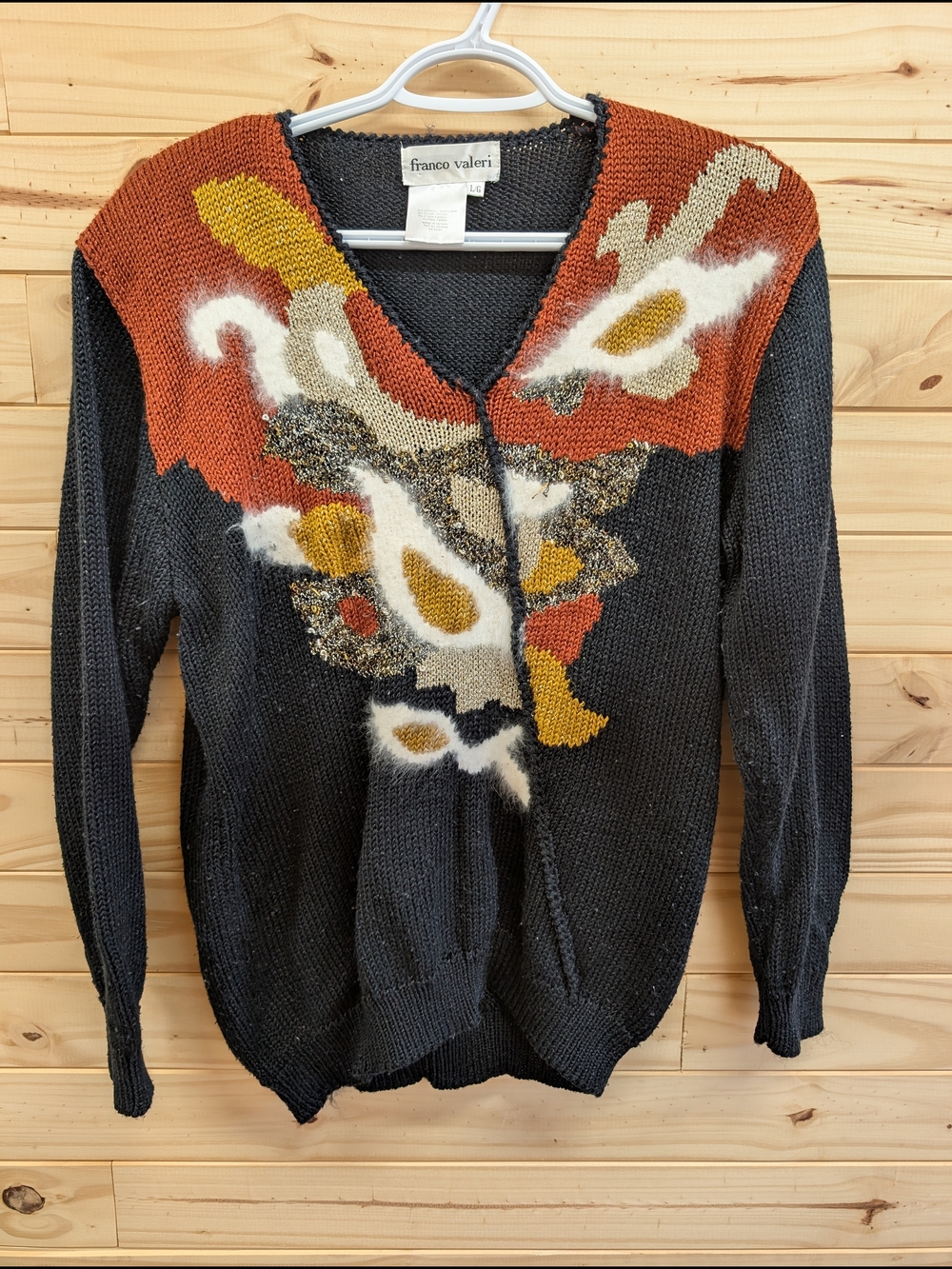 Black Knit Sweater with Rust and Mustard Abstract Yoke